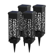 Four black solar-powered garden lights with intricate designs on a white background