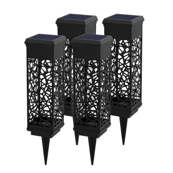 Four black solar-powered garden lights with intricate designs on a white background